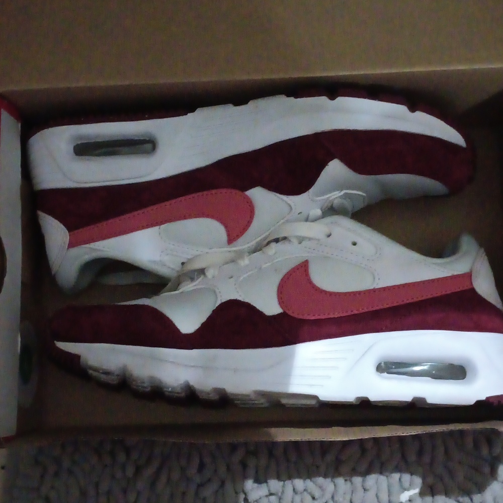 Nike pink and burgundy shoes